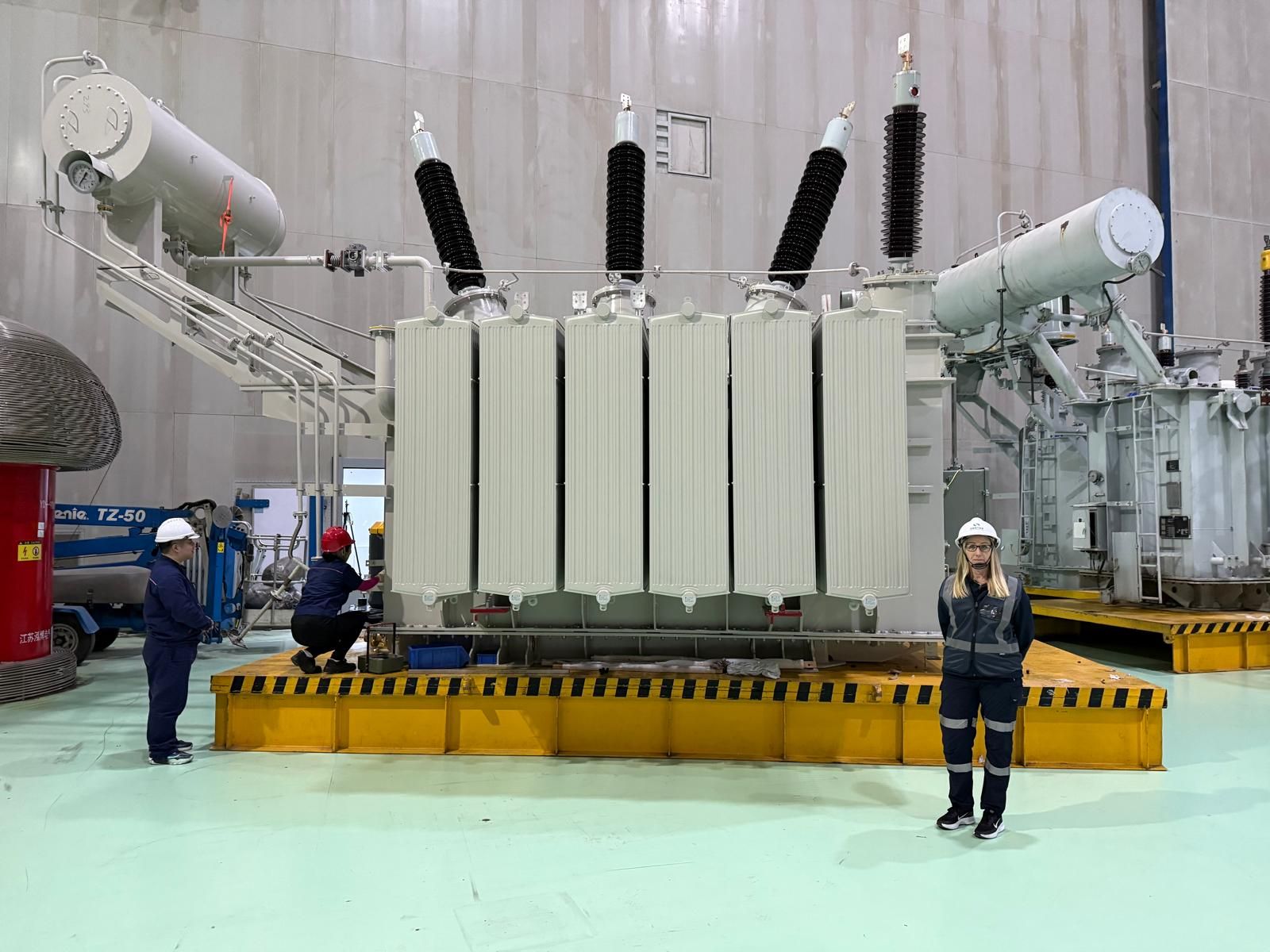 Team infront of transformer